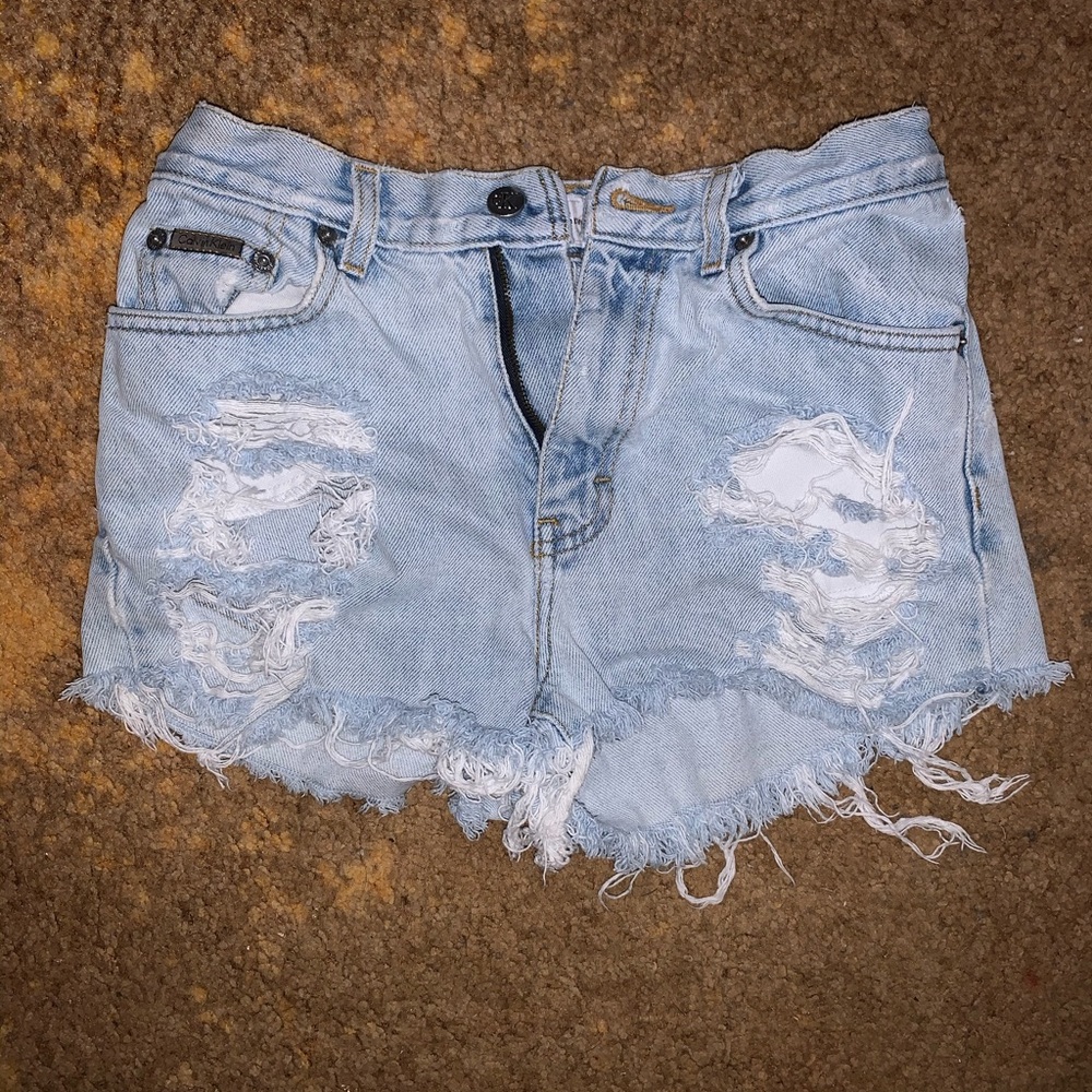 Ripped Calvin Klein high waisted mini shorts